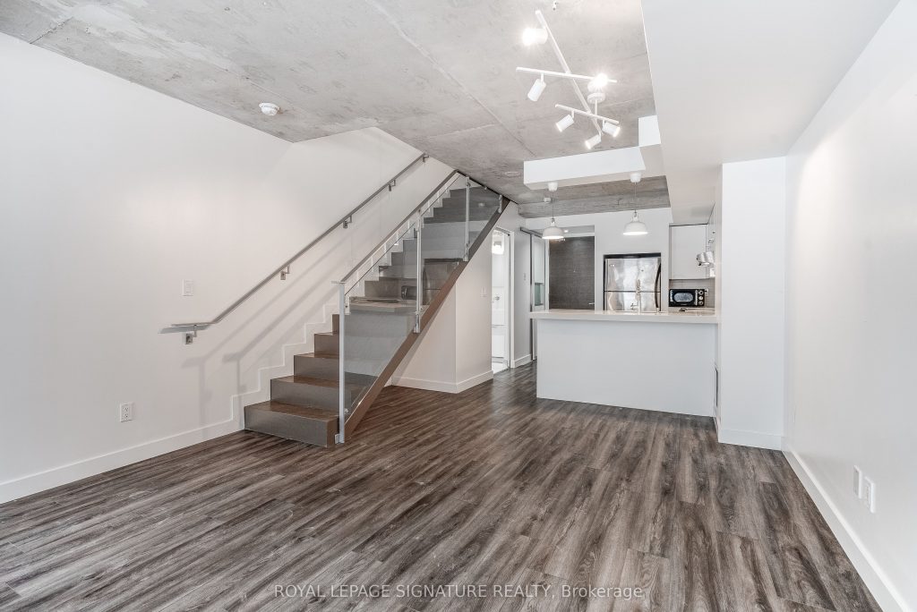 1-bedroom condo apartment for rent in Toronto — 105 - 55 Stewart Street (Photo 1)