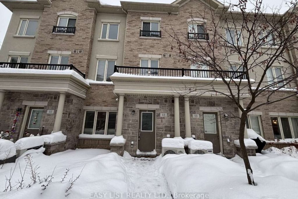 3-bedroom condo townhouse for sale in Toronto — 12 - 25 Coneflower Crescent (Photo 1)