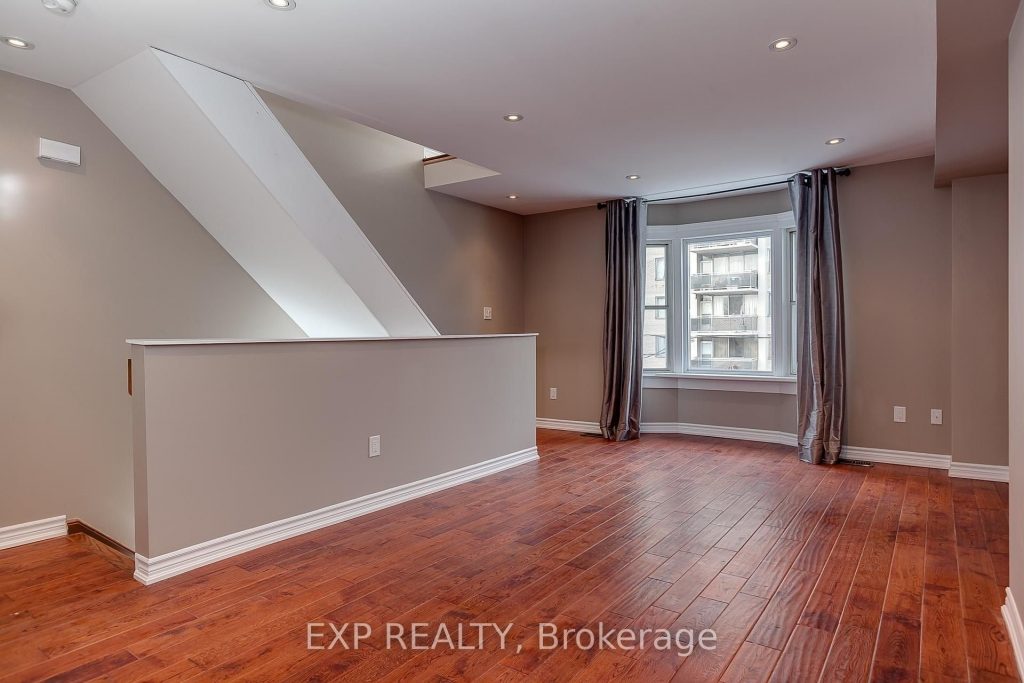 2-bedroom upper level home for rent in Toronto — 2 - 43 Springhurst Avenue (Photo 1)