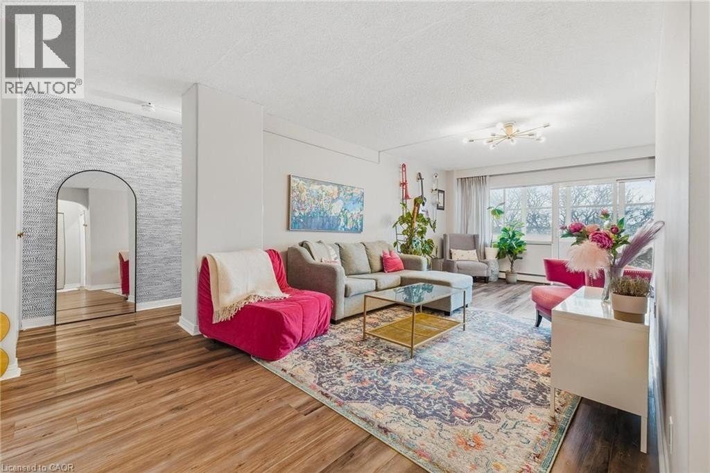 1-bedroom home for sale in Waterloo — 302 - 45 Westmount Road North (Photo 1)