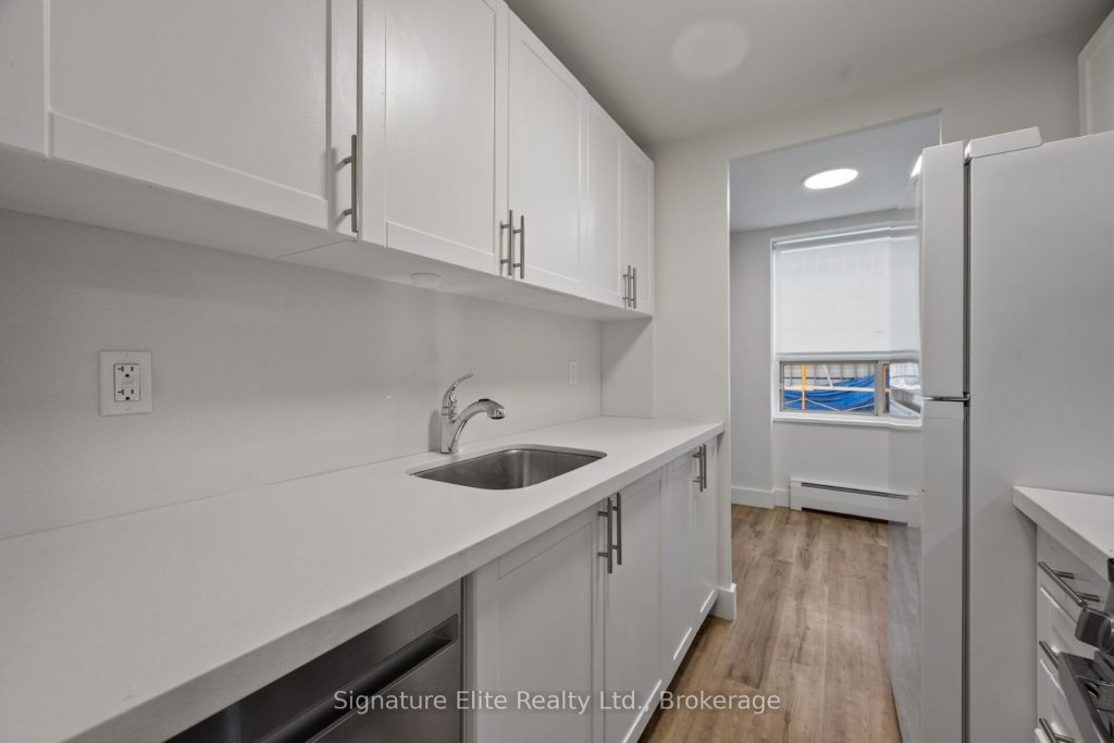 1-bedroom other home for rent in Toronto — 410 - 250 St Clair Avenue W (Photo 1)