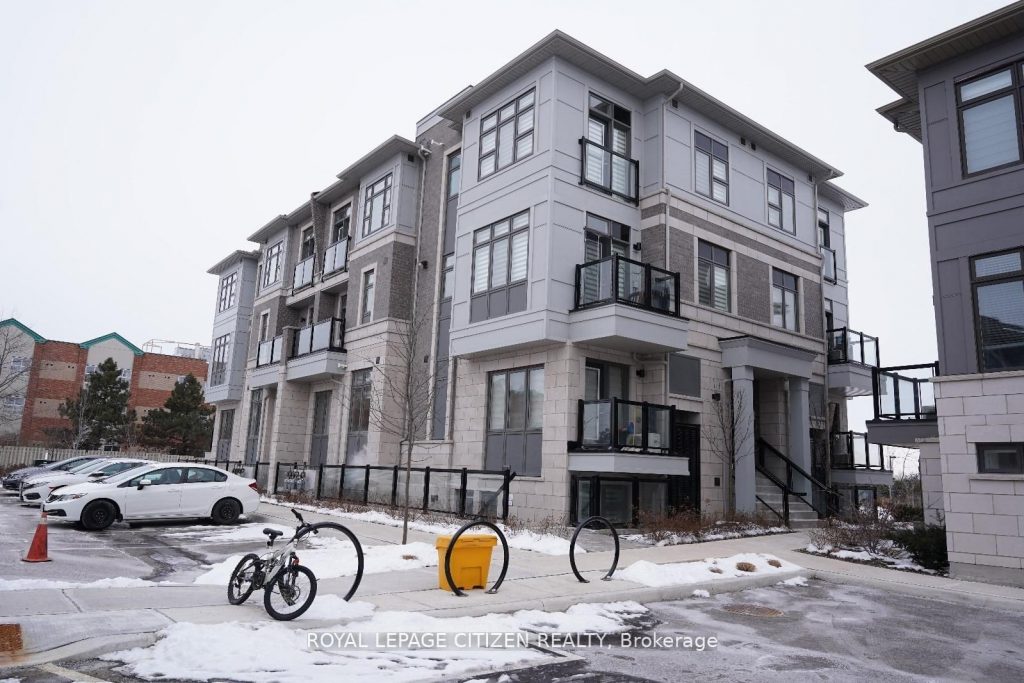 2-bedroom condo townhouse for sale in Brampton — 414 - 70 Halliford Place (Photo 1)