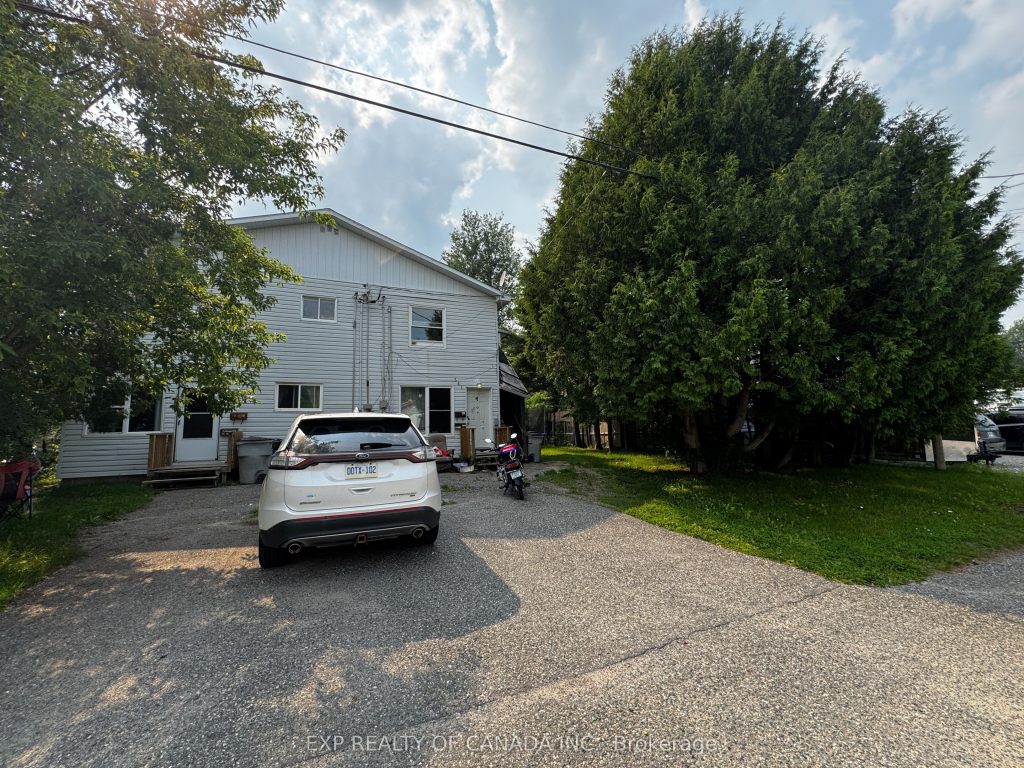 7-bedroom fourplex home for sale in Timmins — 557 Norman Street (Photo 1)