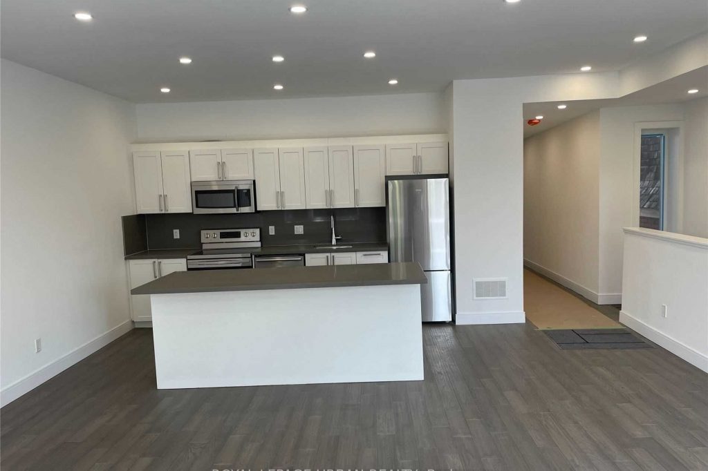 2-bedroom store w apt/office home for rent in Toronto — Unit 1 - 460 Danforth Avenue (Photo 1)