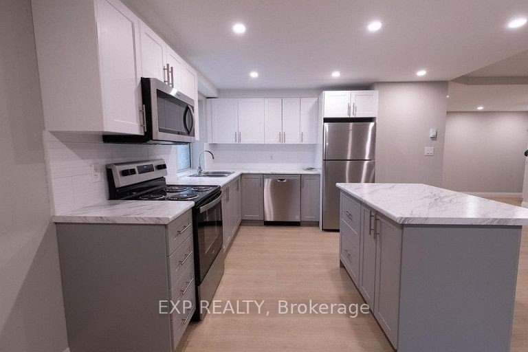 1-bedroom multiplex home for rent in St. Catharines — 105 - 349 Queenston Street (Photo 1)