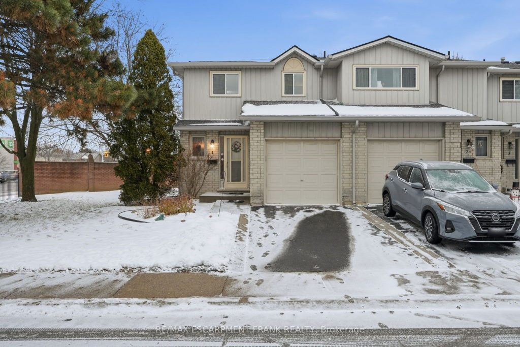 3-bedroom condo townhouse for sale in Hamilton — 1 - 1675 Upper Gage Avenue (Photo 1)