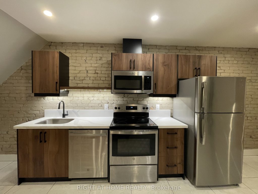 3-bedroom triplex home for rent in Toronto — 1 - 363 Parkside Drive (Photo 1)