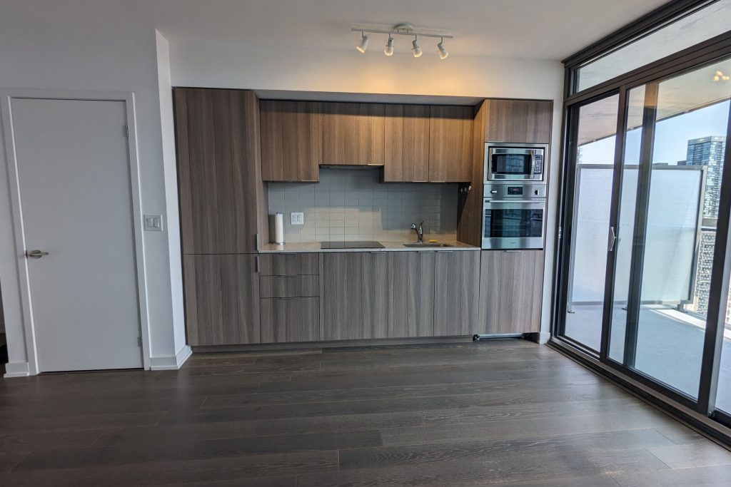 1-bedroom condo apartment for rent in Toronto — 2313 - 11 Wellesley Street W (Photo 1)
