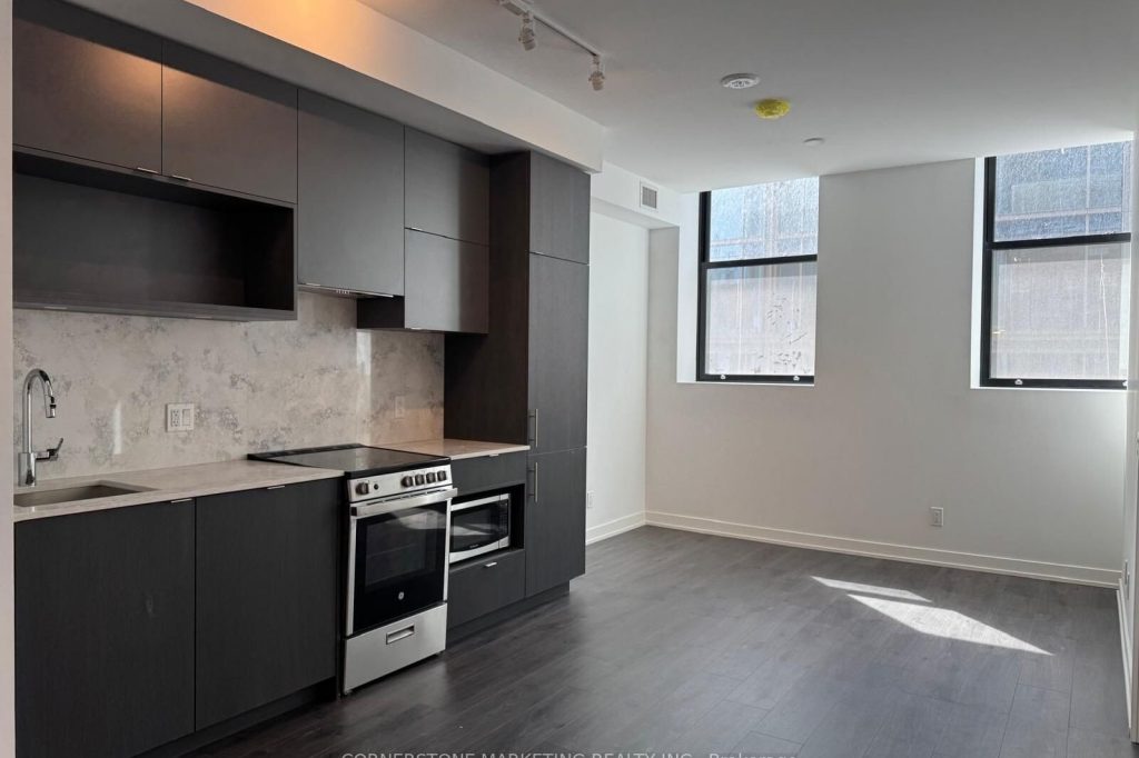 3-bedroom condo apartment for rent in Toronto — 310 - 100 Queen Street E (Photo 1)