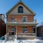 7-bedroom detached home for sale in Frontenac — 310 Victoria Street (Photo 1)