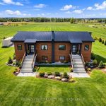 3-bedroom duplex home for sale in Calgary — 4326 County Rd 6 N/a (Photo 1)