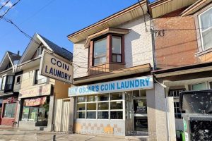Studio store w apt/office home for sale in Toronto — 1048 Gerrard Street E