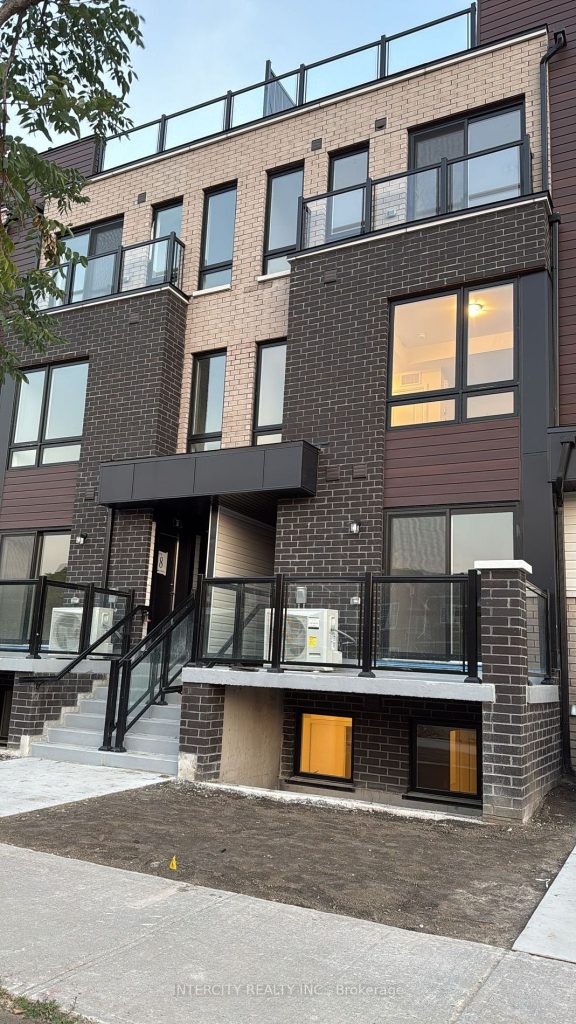 2-bedroom condo townhouse for rent in Toronto — 13 - 245 Mclevin Avenue (Photo 1)
